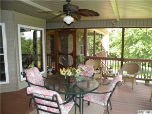 220 Abner Road Stony Point, NC 28678 - Photo 16 of 16 a view of a dining room with furniture window and outside view