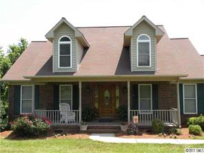220 Abner Road Stony Point, NC 28678 - Photo 2 of 16 a front view of a house with a yard
