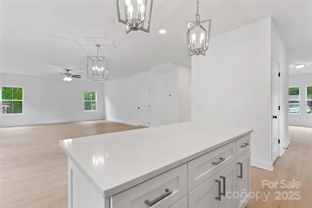 a view of kitchen and sink