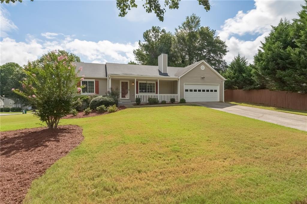 3742 Warriors Path Decatur, GA 30034 - Photo 1 of 1 a front view of a house with a yard and trees