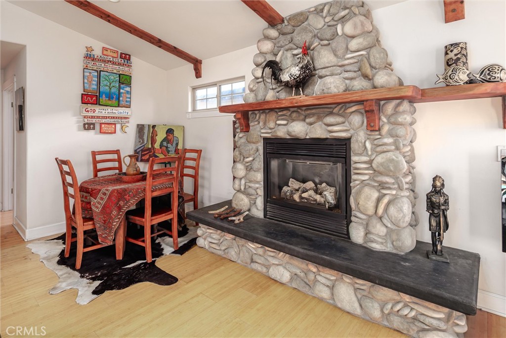 50 South 3rd Street Cayucos, CA 93430 - Photo 13 of 37 Natural Rock Fireplace and beamed vaulted ceilings