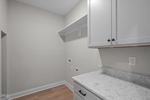 a bathroom with a sink and vanity