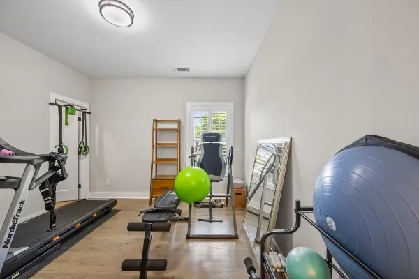a view of a room with gym equipment