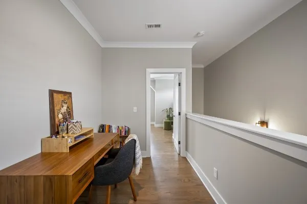 a workspace with furniture and window