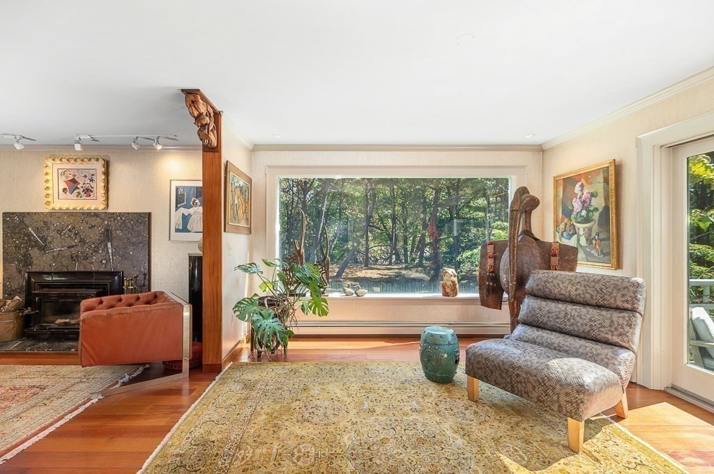 25 Leverett Street Gloucester, MA 01930 - Photo 11 of 41 a living room with furniture and a fireplace