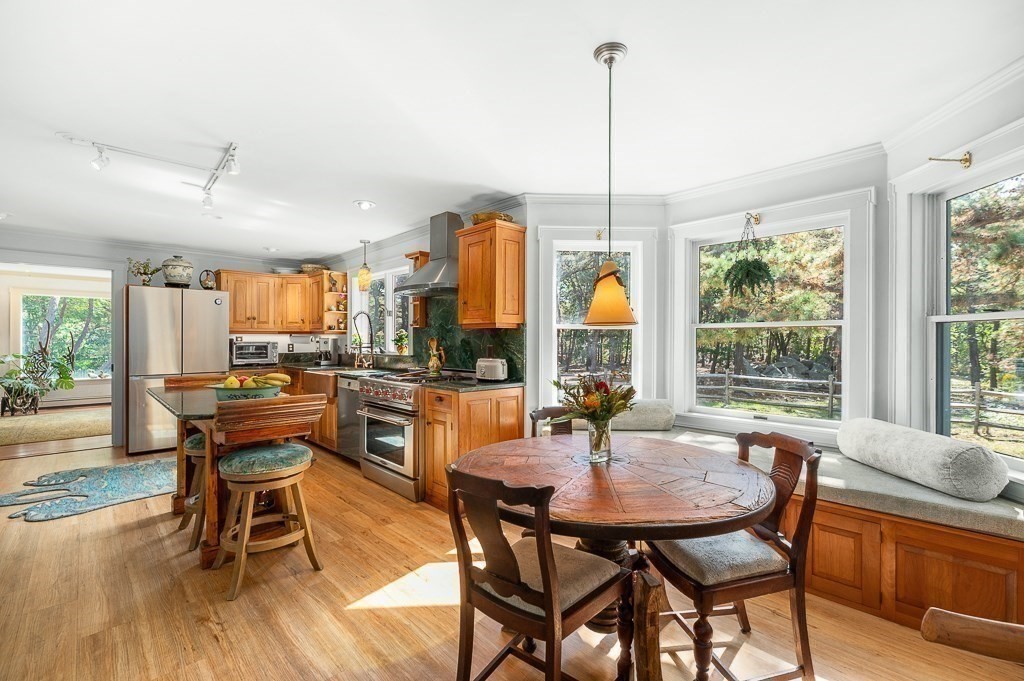 25 Leverett Street Gloucester, MA 01930 - Photo 13 of 41 a dining room with furniture window and wooden floor