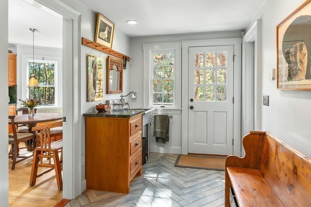 25 Leverett Street Gloucester, MA 01930 - Photo 14 of 41 a bedroom with furniture and a window