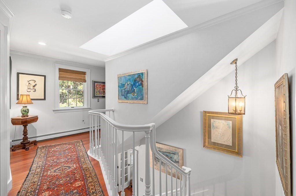 25 Leverett Street Gloucester, MA 01930 - Photo 15 of 41 a living room with wooden floor and a window