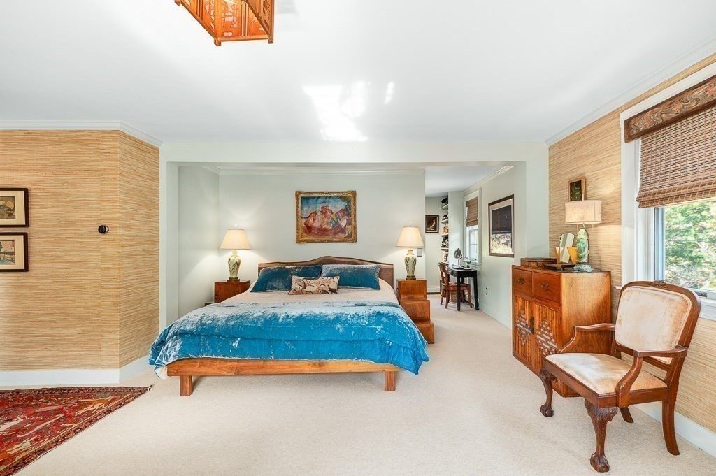 25 Leverett Street Gloucester, MA 01930 - Photo 16 of 41 a bedroom with a bed and wooden floor