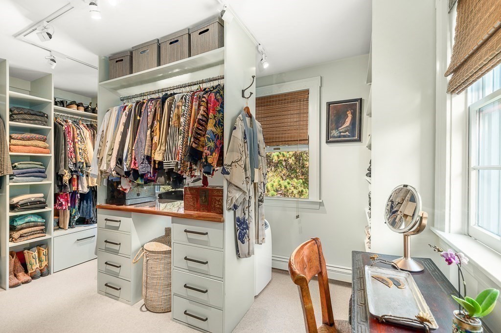 25 Leverett Street Gloucester, MA 01930 - Photo 18 of 41 a view of walk in closet with clothes and shoes