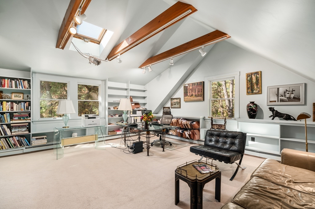25 Leverett Street Gloucester, MA 01930 - Photo 23 of 41 a living room with furniture kitchen view and large windows