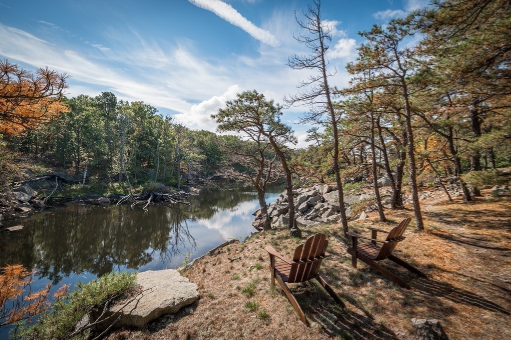 25 Leverett Street Gloucester, MA 01930 - Photo 32 of 41 a backyard of a house with lots of green space