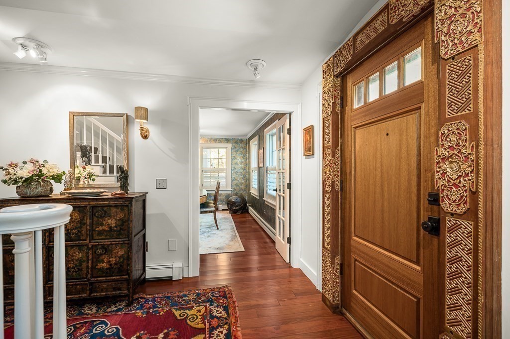 25 Leverett Street Gloucester, MA 01930 - Photo 5 of 41 a view of a hallway view with wooden floor and furniture