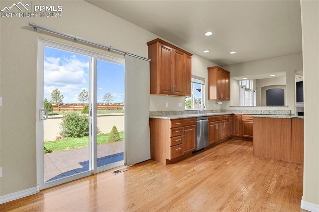 10530 Pictured Rocks Drive Peyton, CO 80831 - Photo 15 of 50 a large kitchen with a large window