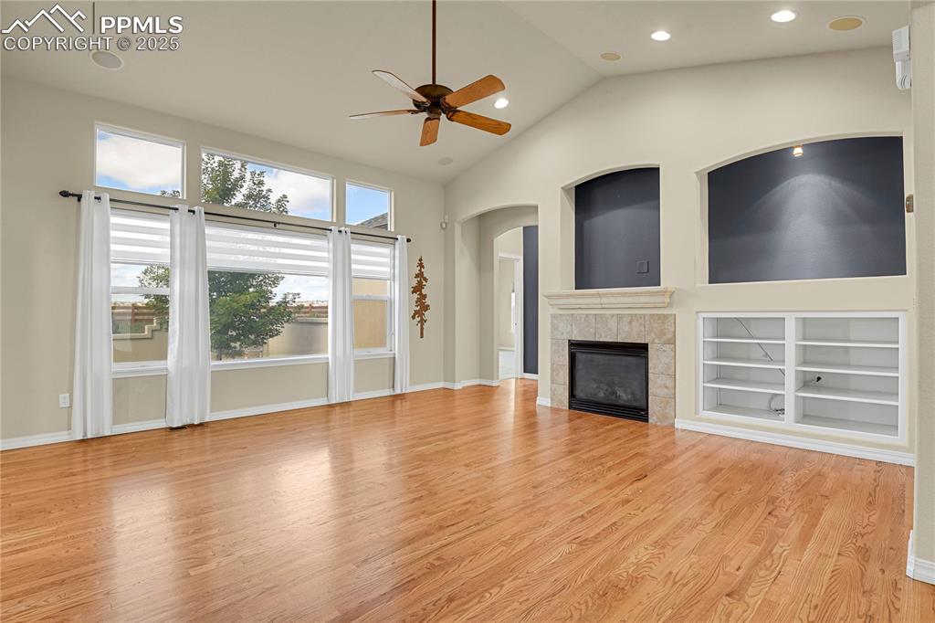 10530 Pictured Rocks Drive Peyton, CO 80831 - Photo 17 of 50 a view of an empty room with a fireplace and a window