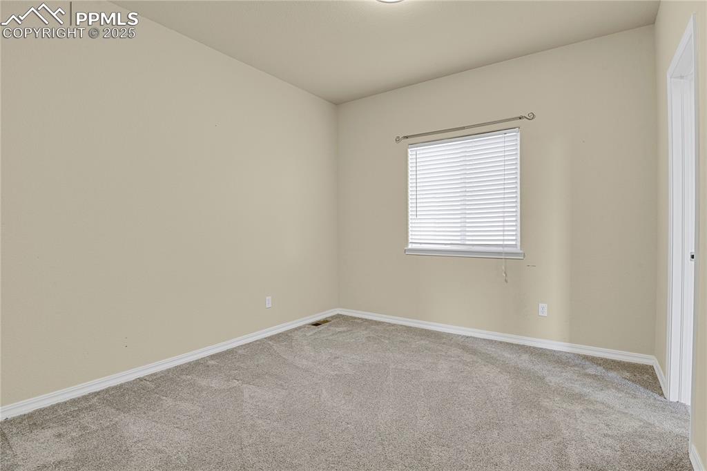 10530 Pictured Rocks Drive Peyton, CO 80831 - Photo 23 of 50 an empty room with a window