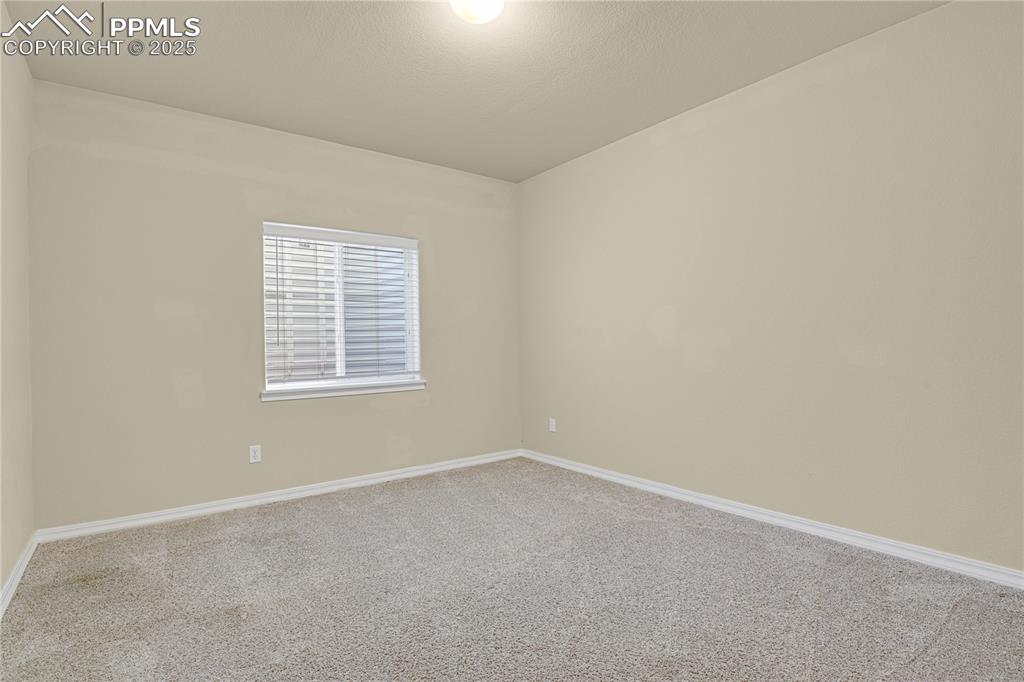 10530 Pictured Rocks Drive Peyton, CO 80831 - Photo 32 of 50 an empty room with a window