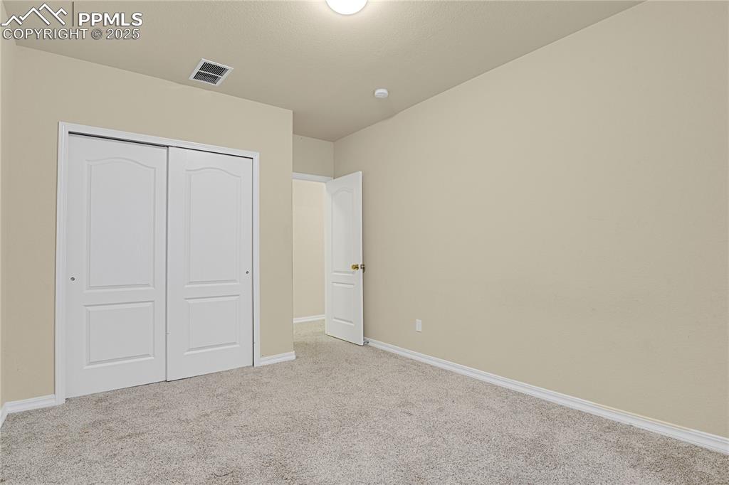 10530 Pictured Rocks Drive Peyton, CO 80831 - Photo 37 of 50 an empty room with closet area