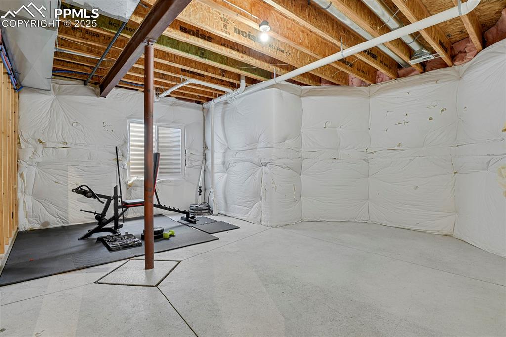 10530 Pictured Rocks Drive Peyton, CO 80831 - Photo 38 of 50 a view of a room with gym equipment