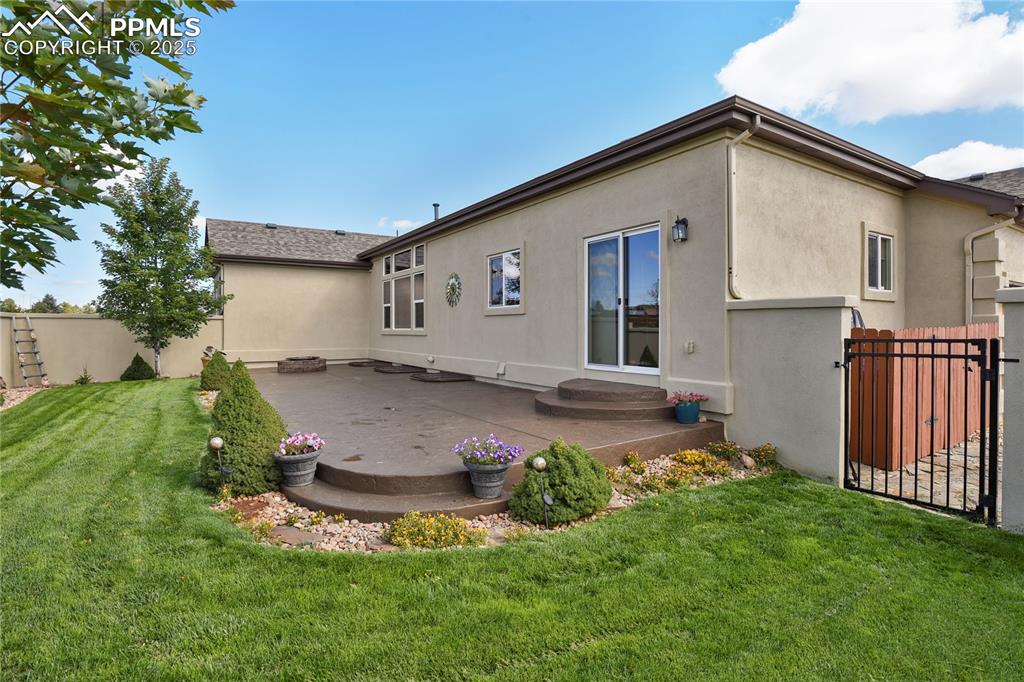 10530 Pictured Rocks Drive Peyton, CO 80831 - Photo 41 of 50 a view of a house with backyard and garden