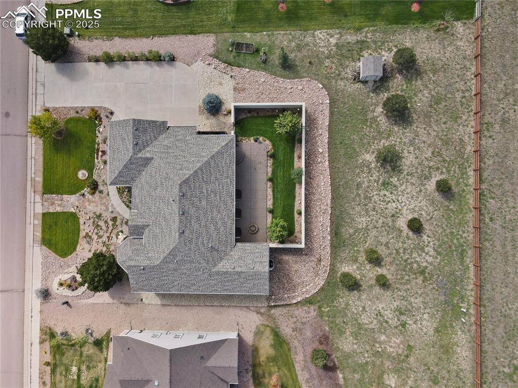10530 Pictured Rocks Drive Peyton, CO 80831 - Photo 48 of 50 an aerial view of a fireplace with garden