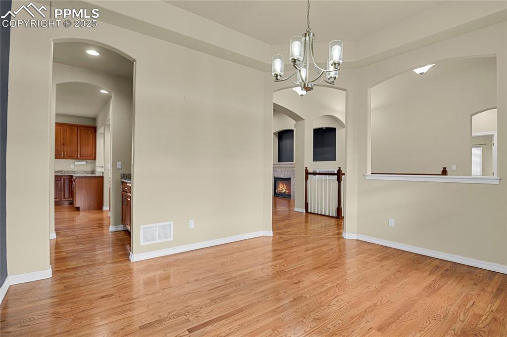 10530 Pictured Rocks Drive Peyton, CO 80831 - Photo 8 of 50 wooden floor in an empty room with a window