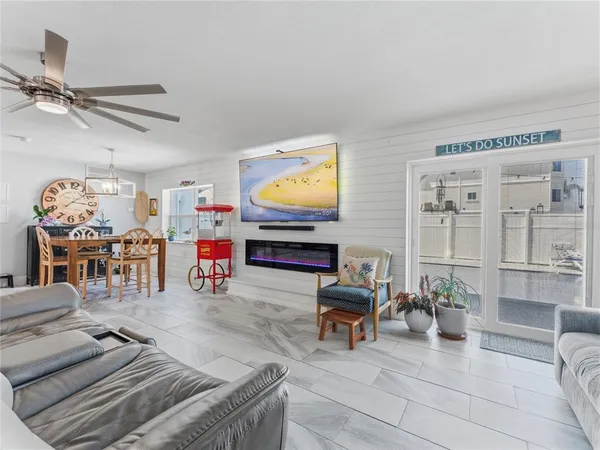 a kitchen with stainless steel appliances granite countertop a stove a sink dishwasher and a refrigerator