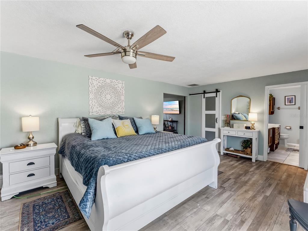 3173 Gulfview Drive Hernando Beach, FL 34607 - Photo 25 of 75 a large white bed in a white room