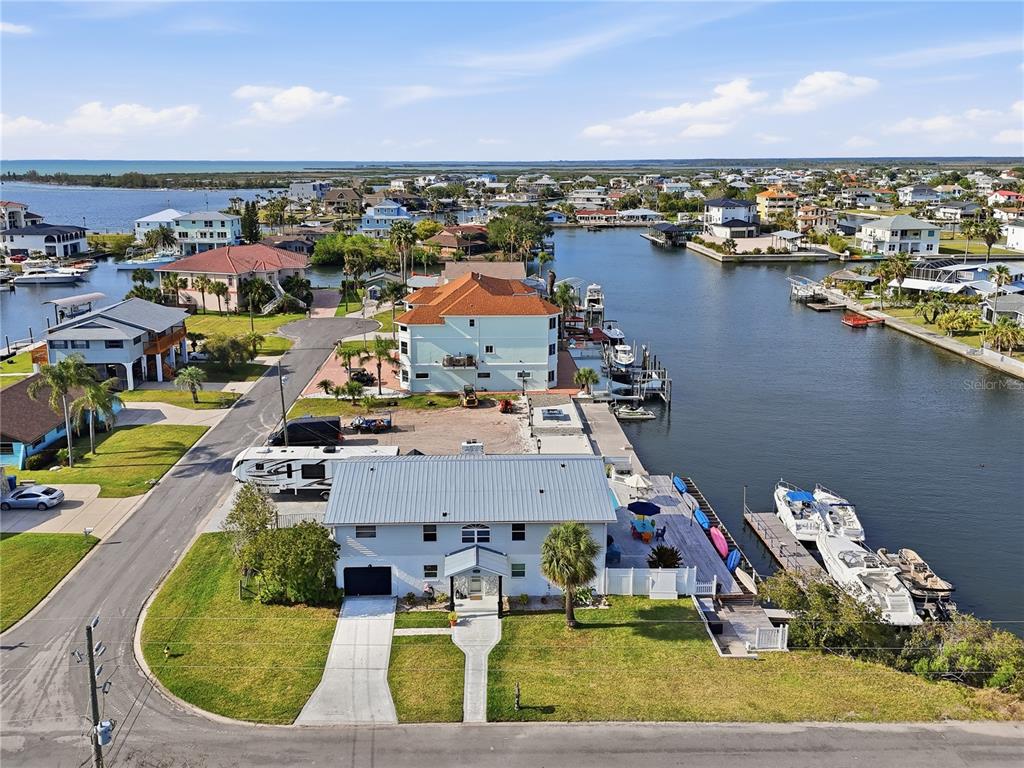 3173 Gulfview Drive Hernando Beach, FL 34607 - Photo 3 of 75 an aerial view of a house with a lake view