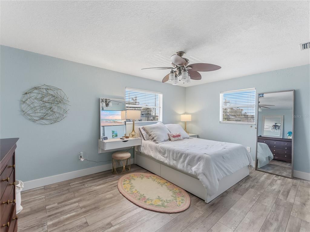 3173 Gulfview Drive Hernando Beach, FL 34607 - Photo 31 of 75 a bedroom with a bed and window