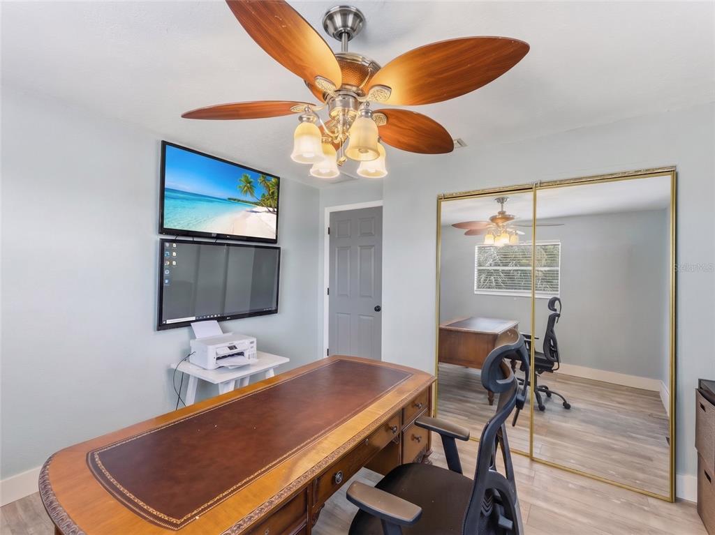 3173 Gulfview Drive Hernando Beach, FL 34607 - Photo 46 of 75 a room with furniture and wooden floor