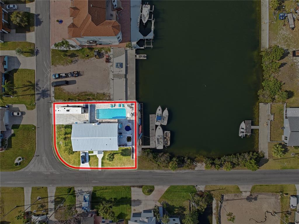 3173 Gulfview Drive Hernando Beach, FL 34607 - Photo 71 of 75 an aerial view of residential houses with outdoor space and parking