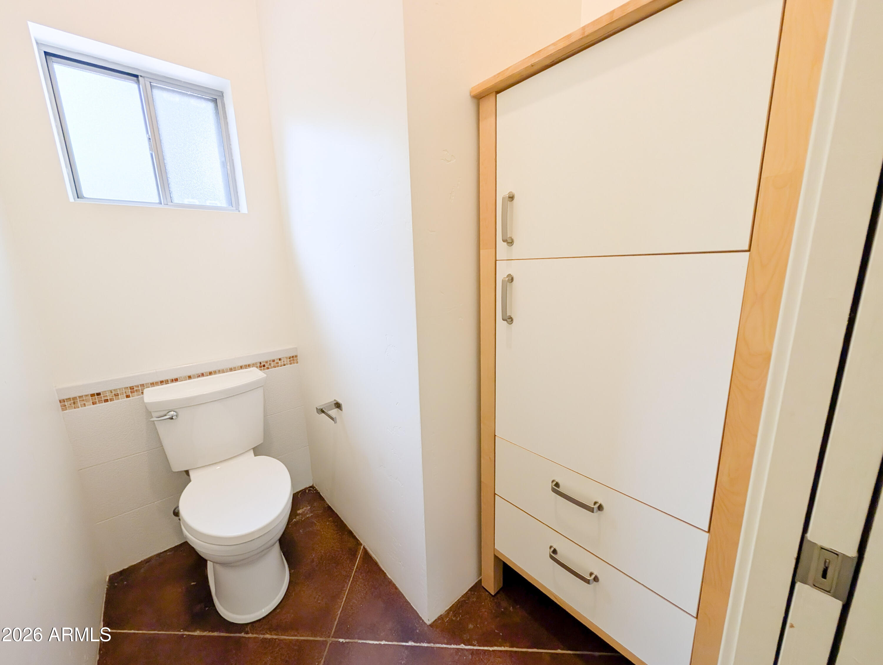 1165 North Willard Road Cottonwood, AZ 86326 - Photo 35 of 122 a bathroom with a toilet and a shower