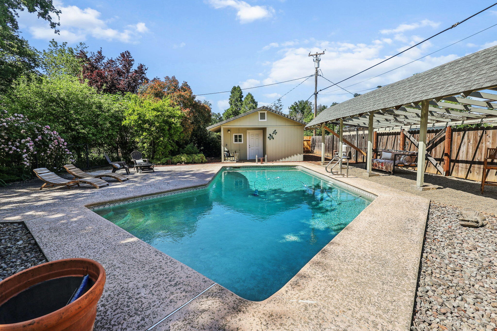 7057 Riata Drive Redding, CA 96002 - Photo 23 of 98 Spacious Pool Deck & Poolhouse