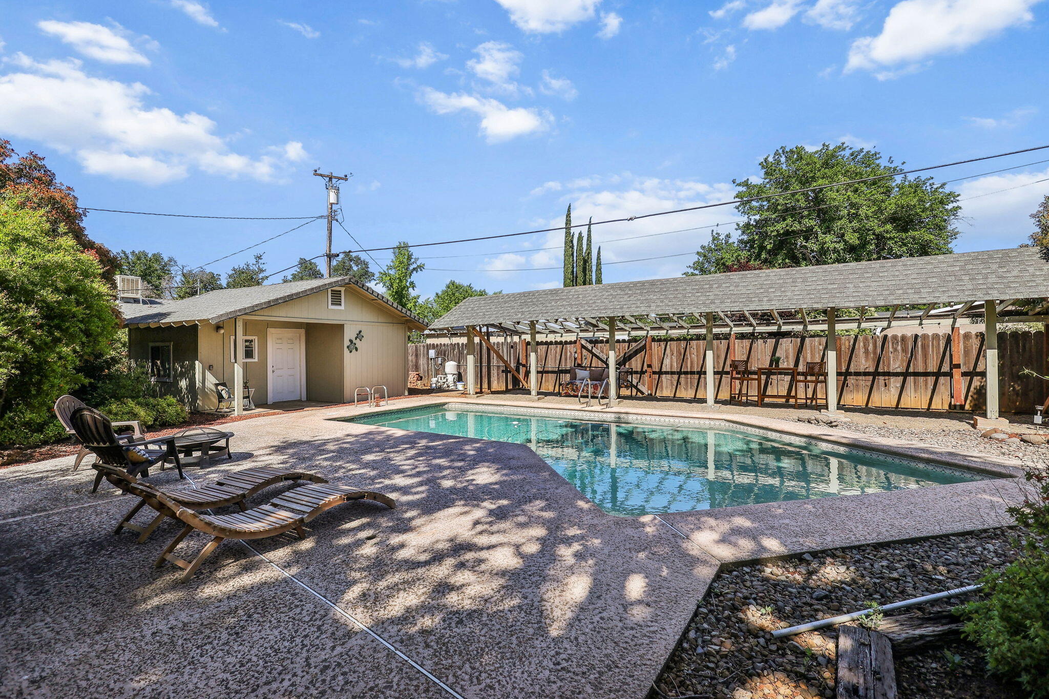 7057 Riata Drive Redding, CA 96002 - Photo 66 of 98 Sparkling Pool with Pergola & Pool House