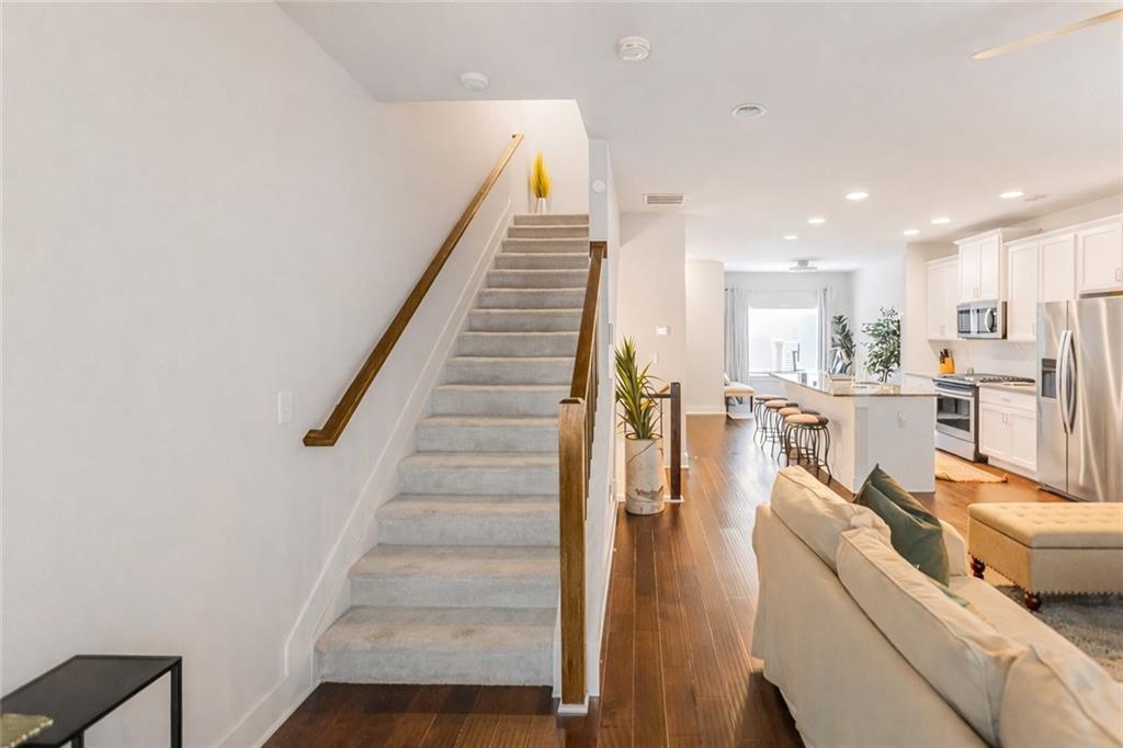 2170 Wiggins Walk Atlanta, GA 30316 - Photo 14 of 17 a view of a kitchen with furniture and wooden floor