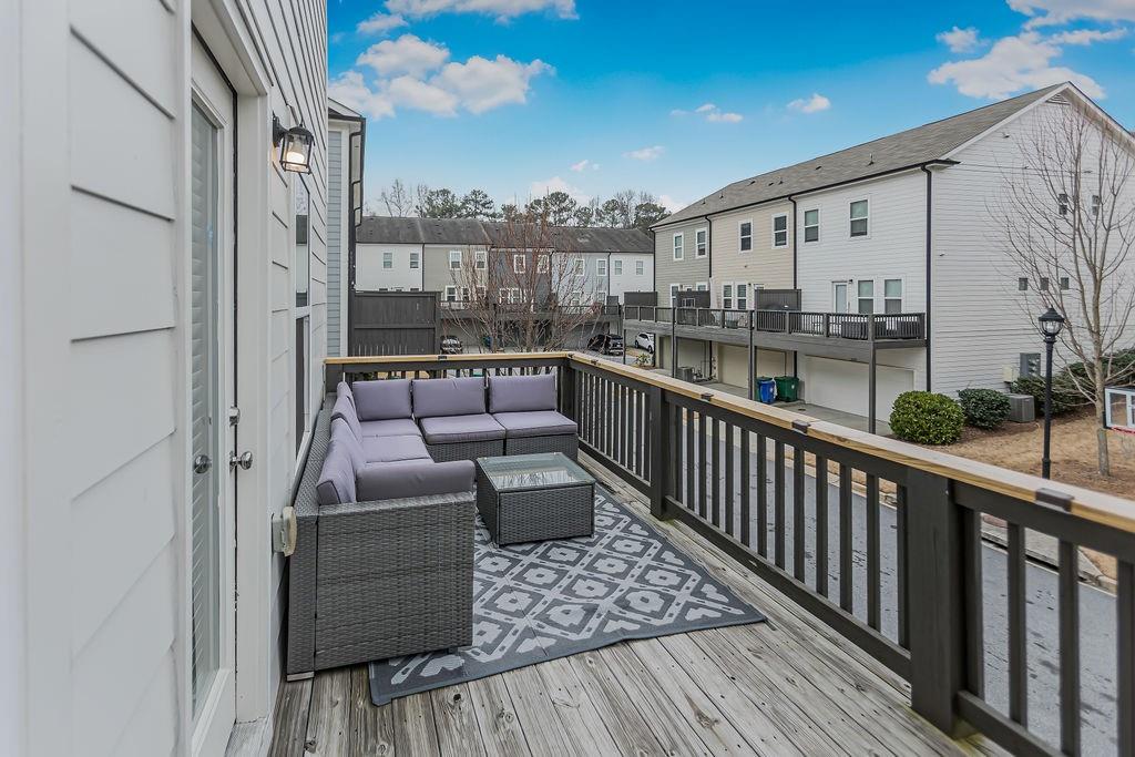 2170 Wiggins Walk Atlanta, GA 30316 - Photo 17 of 17 a balcony with furniture and city view