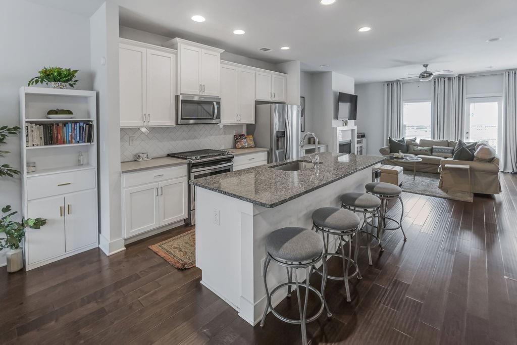 2170 Wiggins Walk Atlanta, GA 30316 - Photo 3 of 17 a large kitchen with a table and chairs
