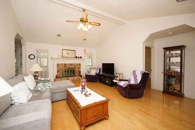 a view of an empty room with a large window