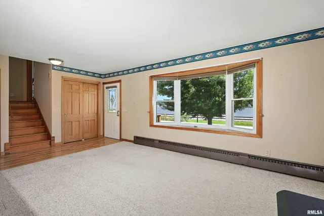 $345,000 | 1128 North Cody Road, Le Claire, IA 52753