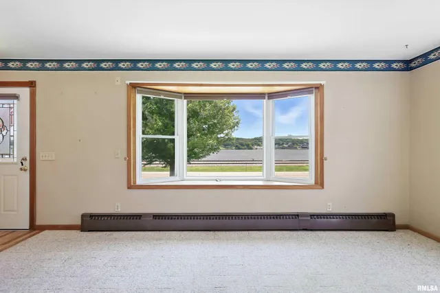 $345,000 | 1128 North Cody Road, Le Claire, IA 52753