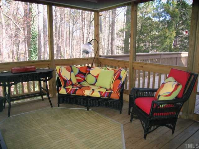 8804 Boar's Head Court Raleigh, NC 27613 - Photo 11 of 12 The screened porch is another marvelous gathering spot, with outdoor speakers, a ceiling fan, & double doors leading inside. The owner also constructed the porch and the deck so that this could be used as a sleeping porch in nice weather! Screened Porch