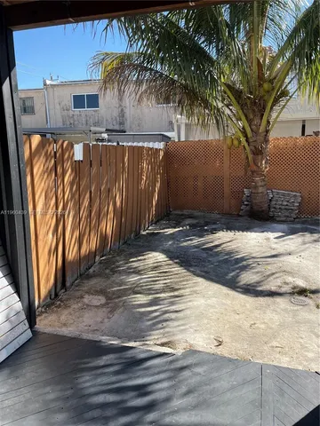 a view of a backyard of a house
