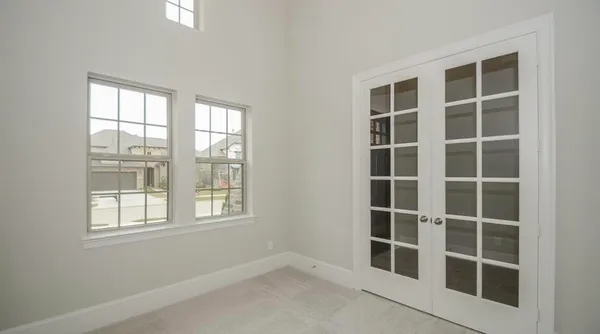 a view of empty room with windows