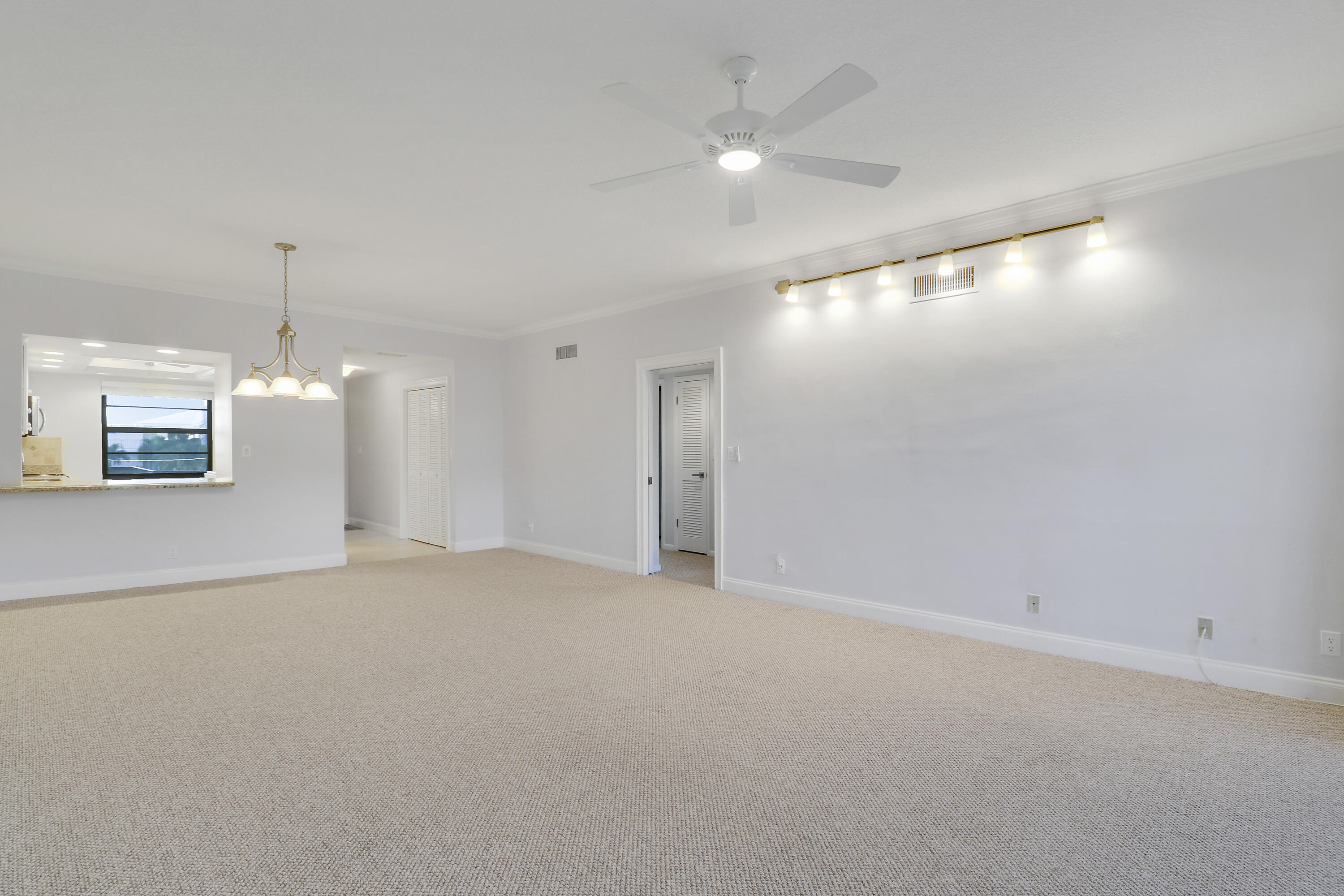275 South Beach Road, Unit B202 Tequesta, FL 33469 - Photo 13 of 37 a view of an empty room with a window