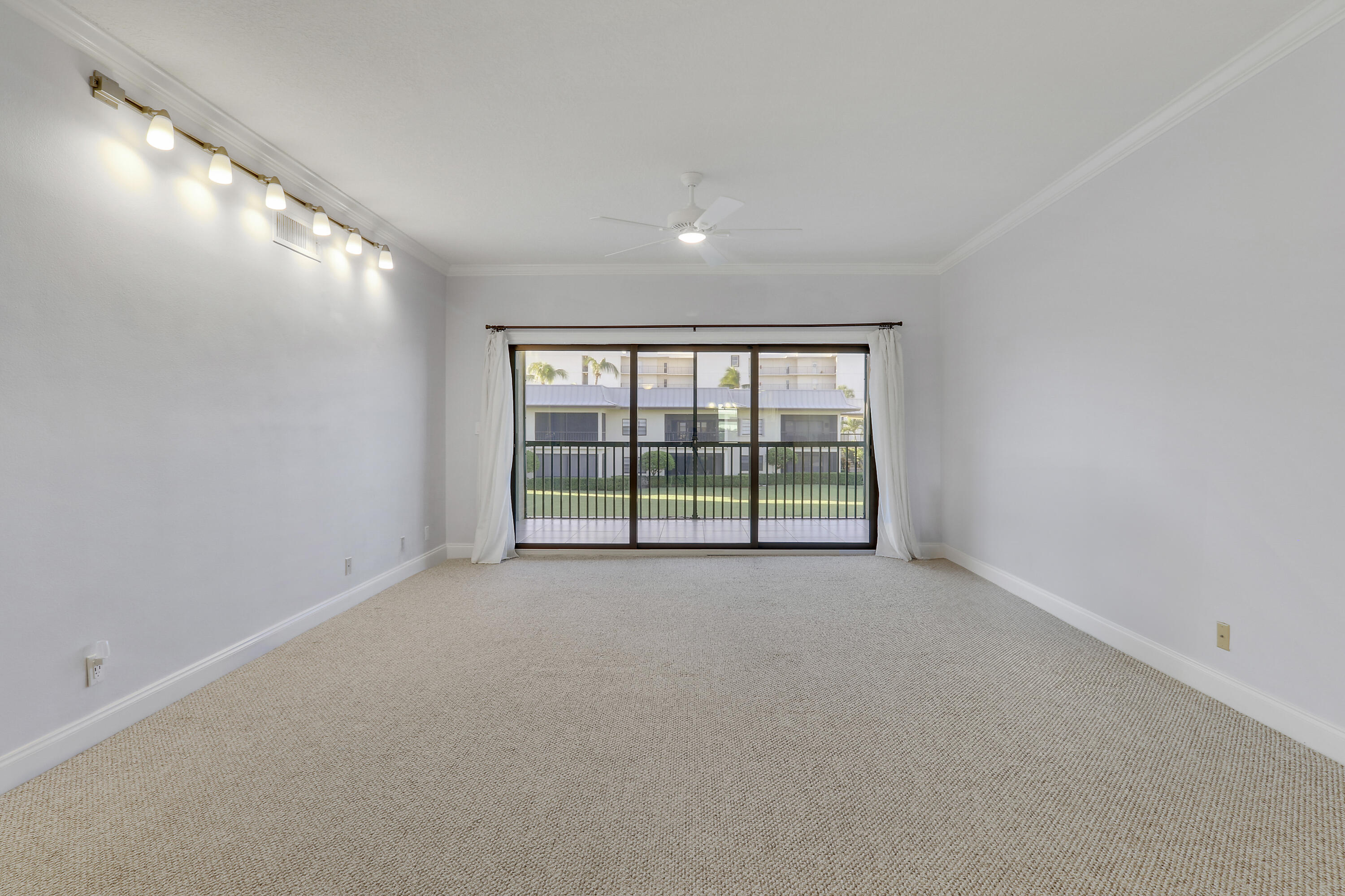 275 South Beach Road, Unit B202 Tequesta, FL 33469 - Photo 18 of 37 a view of an empty room with a window