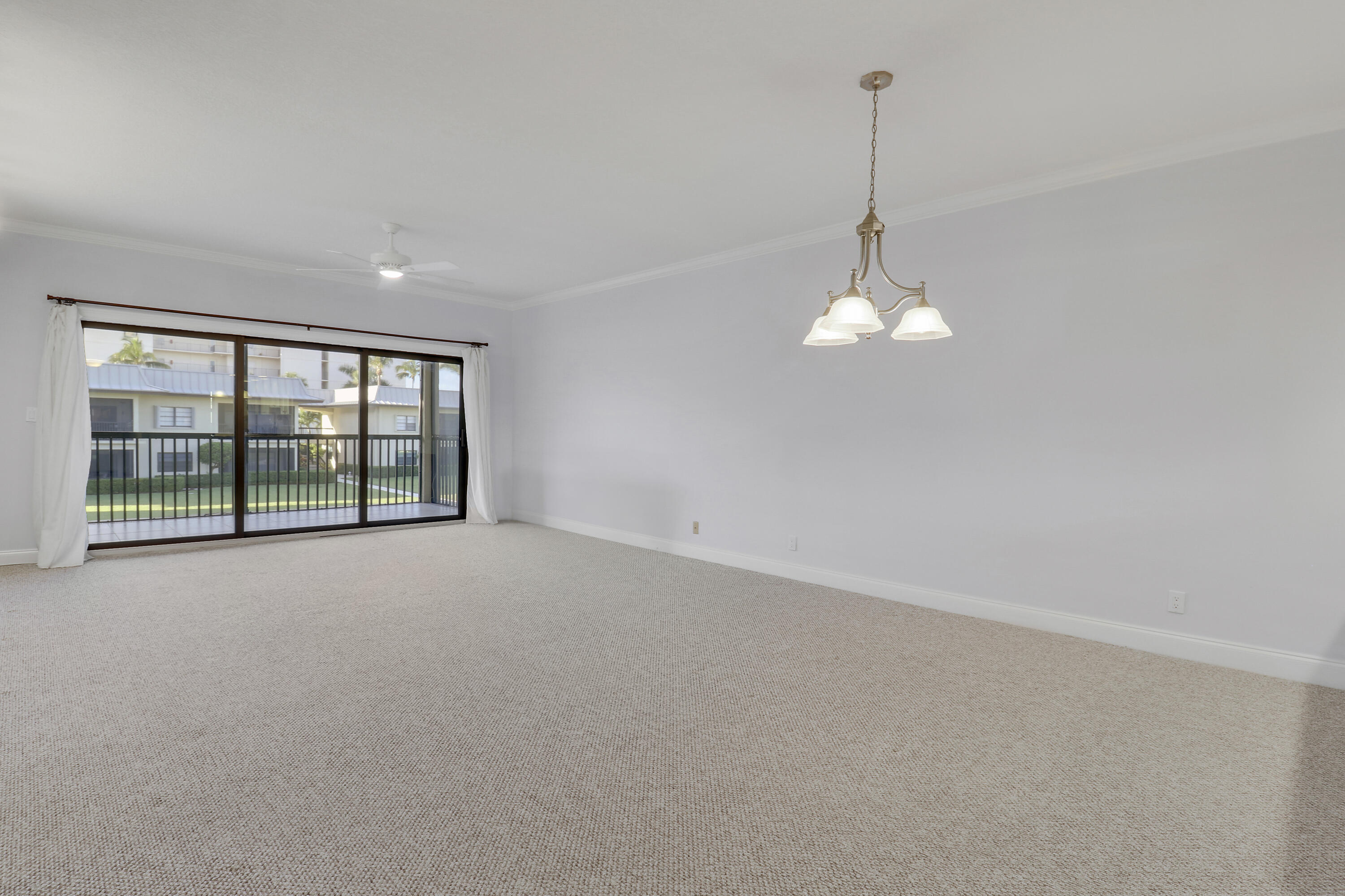 275 South Beach Road, Unit B202 Tequesta, FL 33469 - Photo 21 of 37 a view of an empty room with a window
