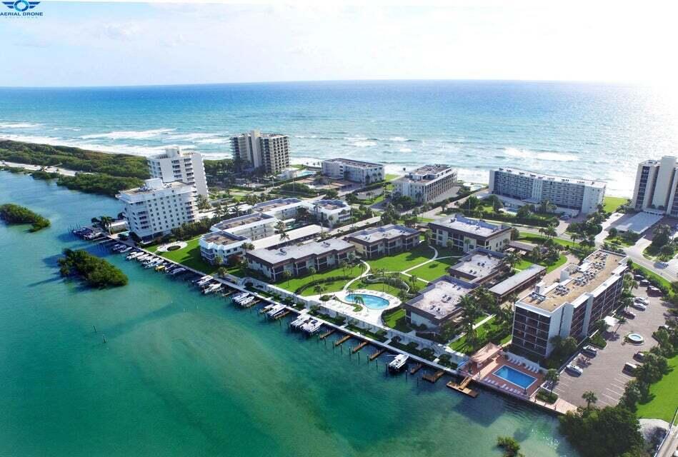 275 South Beach Road, Unit B202 Tequesta, FL 33469 - Photo 3 of 37 an aerial view of multiple house