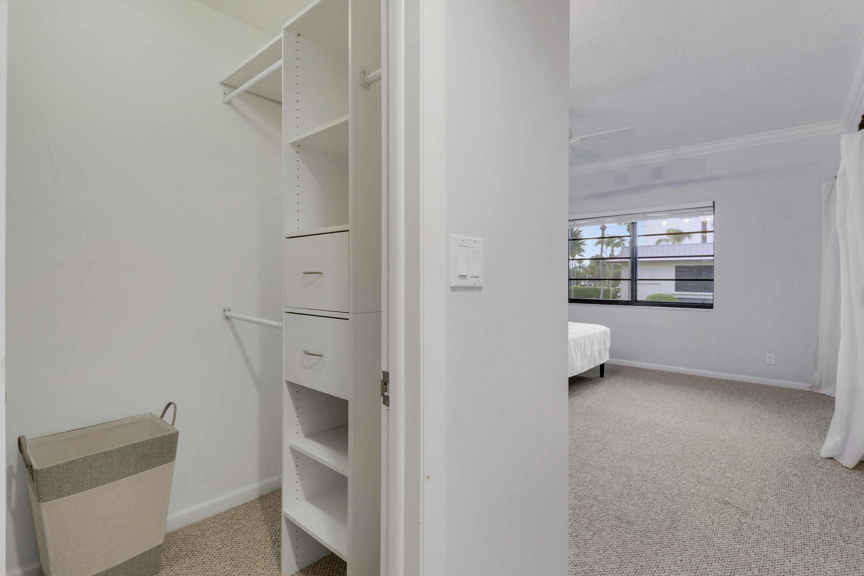 275 South Beach Road, Unit B202 Tequesta, FL 33469 - Photo 32 of 37 a view of an empty room with a fireplace and a window