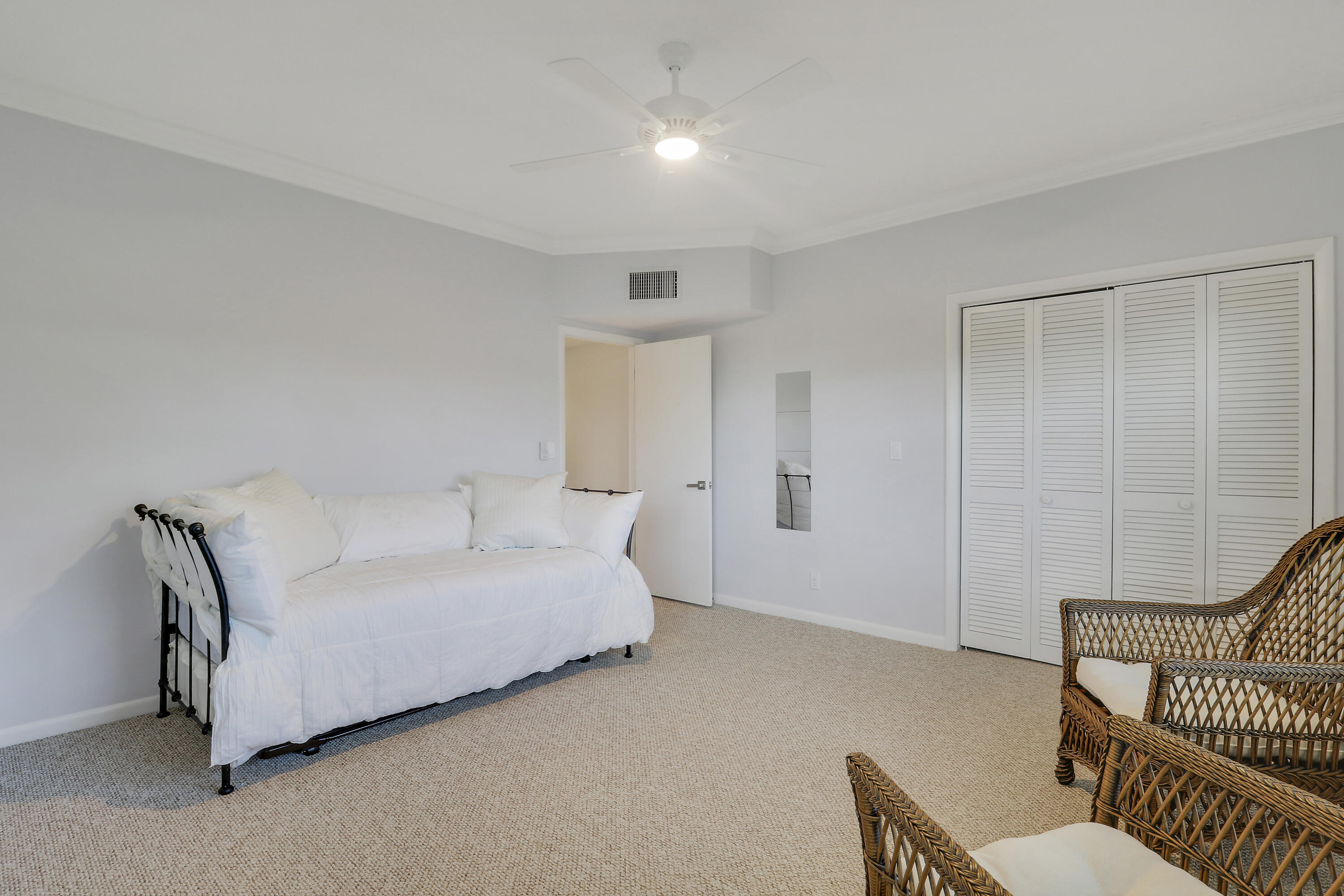 275 South Beach Road, Unit B202 Tequesta, FL 33469 - Photo 34 of 37 a living room with furniture and a window